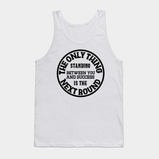 Between you and success is the next round. Tank Top